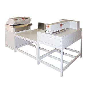 The intimus PacMaster XL is a machine that is used to cut paper.